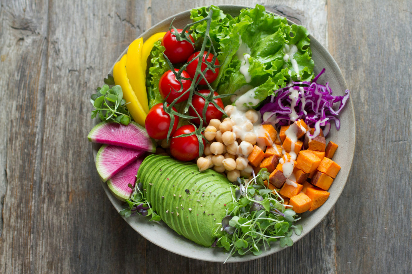 A bowl brimming with fresh vegetables and fruits, highlighting the importance of nutrition.